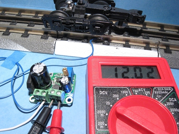 dc voltmeter sets ac-dc converter to 12v DC output
