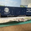 Atlas Norfolk and Western 3-rail O scale auto parts boxcar spotting technique (blue)