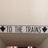 To The Trains Sign