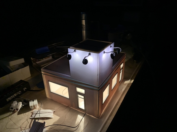 In-work photo - White Tower Model - LED lights shown in dark scene