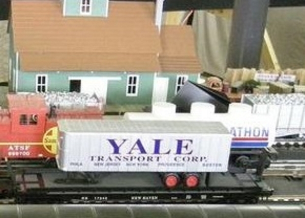Weaver YALE trailer atop NH flat car