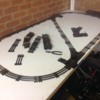 C4804F0D-36AA-42A2-8360-6EDADF758670: Lionel O31 tubular track; over loop with reversing loop