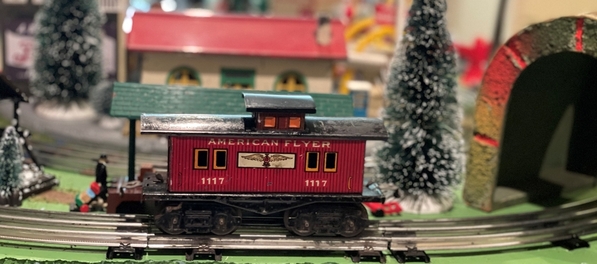 American Flyer 1117 caboose side view on layout