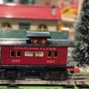 American Flyer 1117 caboose side view on layout