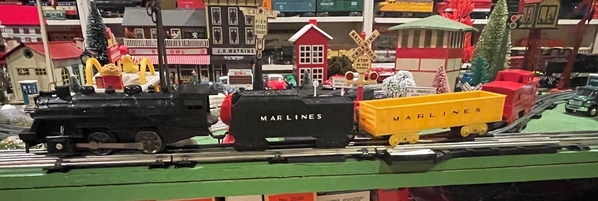 Marx Marlines train engine, tender, gondola, and caboose 