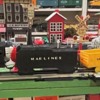 Marx Marlines train engine, tender, gondola, and caboose
