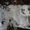 DSCF6680: It took 30 mintutes to do the plaste sheets. I let dry over night and then go a small tub a sheet rock mud and thinly covered the whole mountain.  next day I painted it with semi gloss white paint and while wet I shook  "Flocking"  on it for that real sno