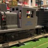 Lionel 18912 Amtrak Industrial Switcher close up with express car