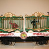200 series Circus Flat Cars 2 005: 200 series circus flat car with two green circus cage wagons load
