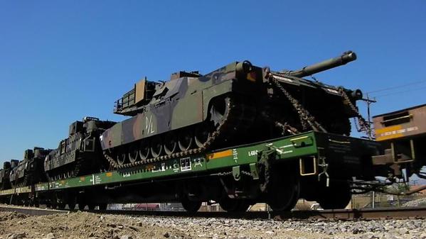 military tank on flatcar