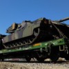military tank on flatcar