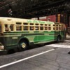 IMG_1647: Fifth Avenue Coach Co. Lines GMC Bus crosses under the EL