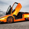Lamborghini-Murcielago-LP670-SV-orange-supercar_1280x800: The doors on the model open like the real thing! (The picture is the real car)