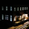 Industrial area - bldg_lighted: Trackside loading dock at night