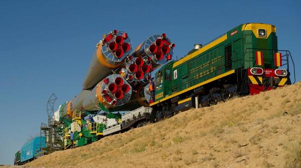 Soyuz rocket delivered to the launchpad by train. Public domain photo by NASA
