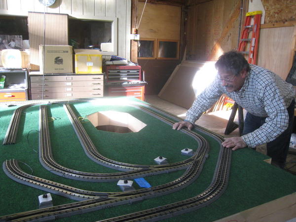 Tom straightening track on Family Heritage Layout