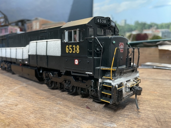 Front left of MTH U30C working on handrails [3-rail scale)