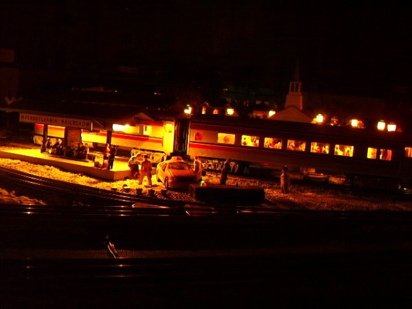 Station [MTH) and 2 passenger cars - night