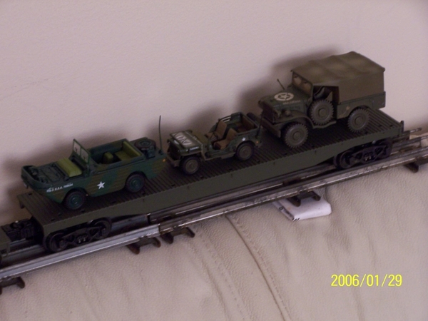 100_4351 Army amphibian, jeep and .75 tn truck on flat